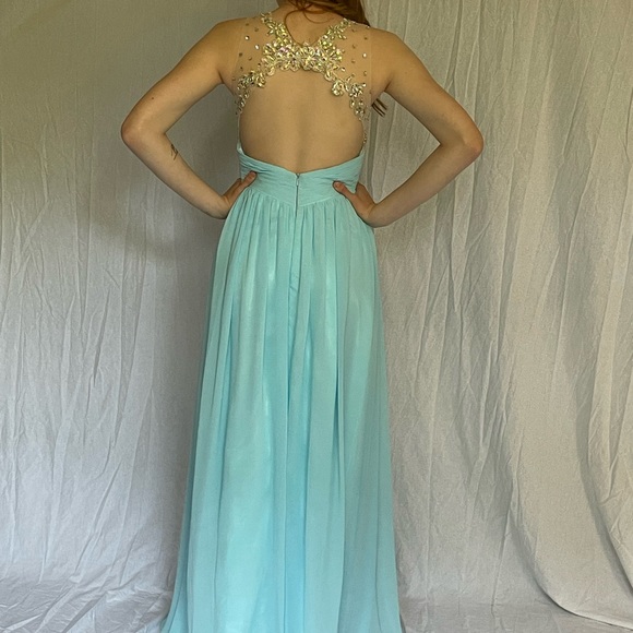 Beaded and ice blue formal gown. Size 2-4. Very flattering - Picture 2 of 6